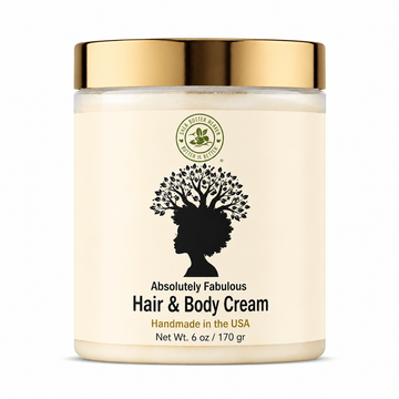 Shea Butter Heaven Absolutely Fabulous Hair & Body Cream in a clear 6 oz jar with a gold lid and cream-colored label featuring a black natural hair silhouette tree design on a white background.