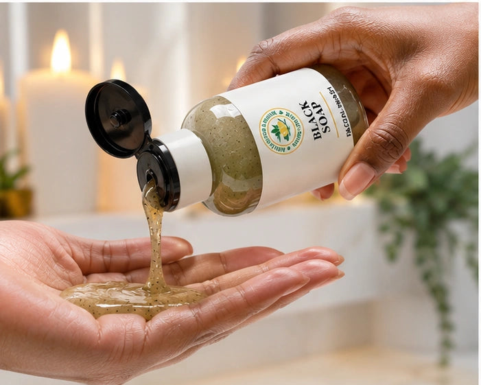 Shea Butter Heaven Black Soap Facial Wash being dispensed into hands during a skincare cleansing routine.
