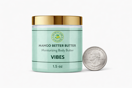 Shea Butter Heaven Mango Better Butter Vibes 1.5 oz mini moisturizing body butter jar shown next to a quarter for size comparison on a white backgroun