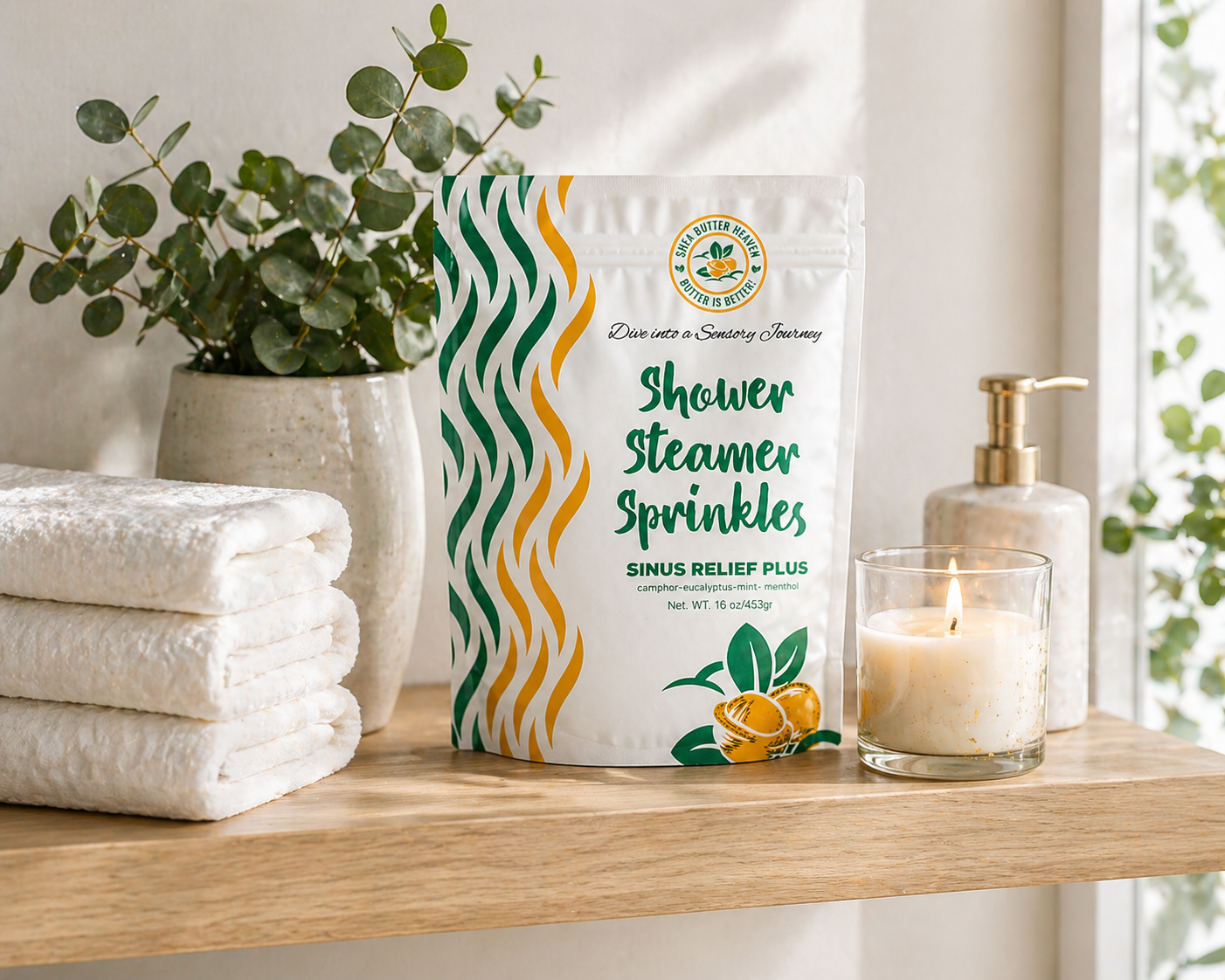 Sinus Relief Plus Shower Steamer Sprinkles pouch displayed on a bathroom shelf with eucalyptus plant, folded towels, and candle in a luxury spa setting